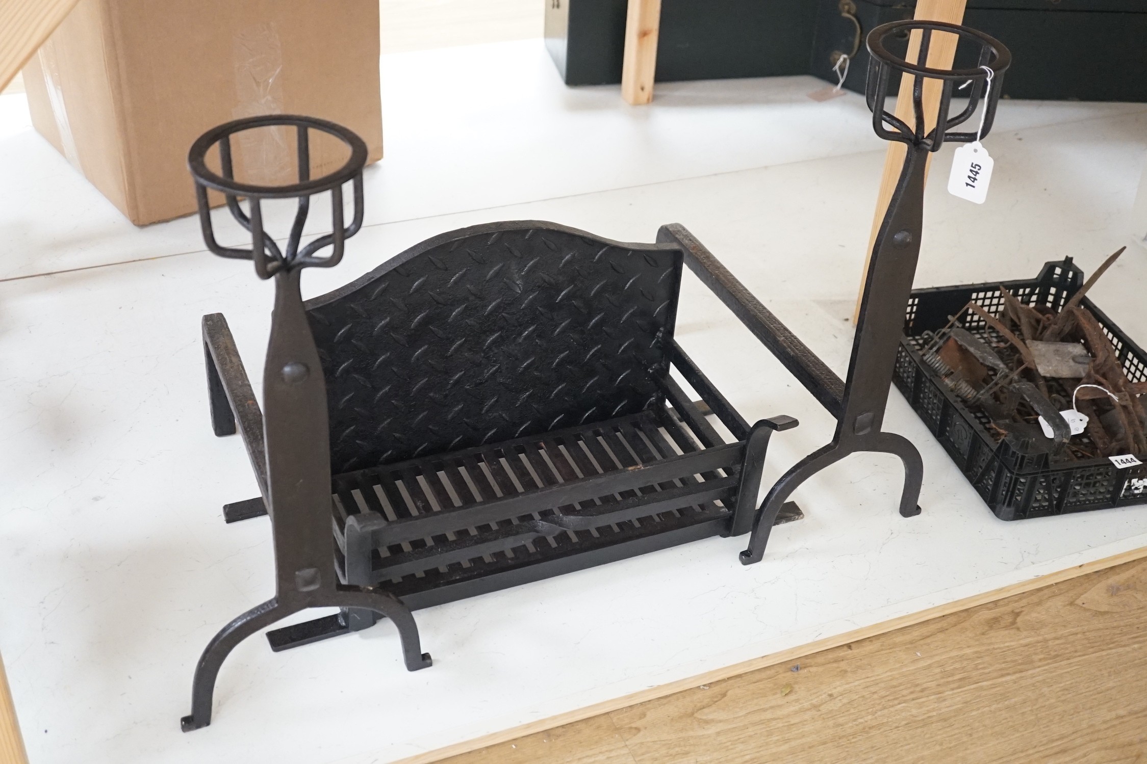 A cast iron fire basket and pair of fire dogs, height 58cm